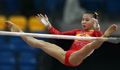 Китайской золотой медалистке Хэ Кэсинь в 2007 г. было всего 13 лет. Фото:KARIM JAAFAR/AFP/Getty Images