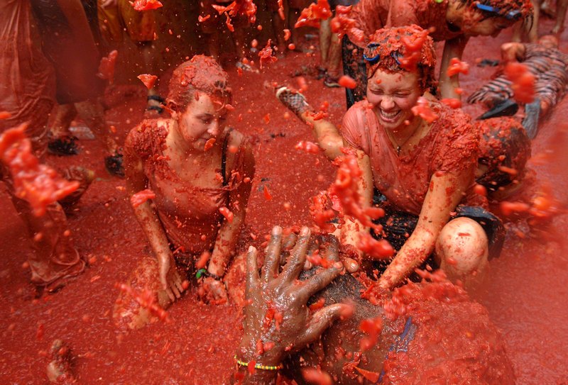 Помідорна битва на фестивалі «Ла Томатина», Буньоль, Іспанія. Фото: Ander Gillenea/Getty Images 
