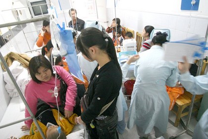 Близько ста дітей провінції Гуандун отруїлися молоком компанії «Дасянь». Фото: The Epoch Times