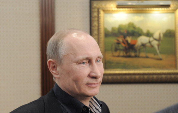 Премьер Владимир Путин лидирует на президентских выборах в России. Фото: ALEXEY DRUZHININ/AFP/Getty Images