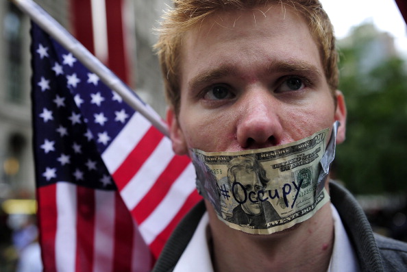 Акция протеста под названием «Захвати Уолл-стрит». Фото: FREDERIC J. BROWN/Getty Images