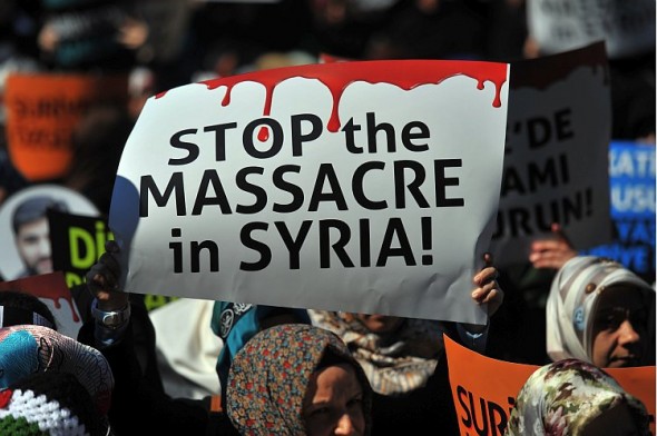 Акция протеста в Сирии 18 марта 2012 года. Фото: Mustafa Ozer/AFP/Getty Images