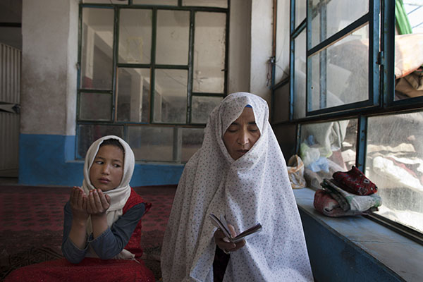Молитва афганских женщин. Фото: Paula Bronstein /Getty Images