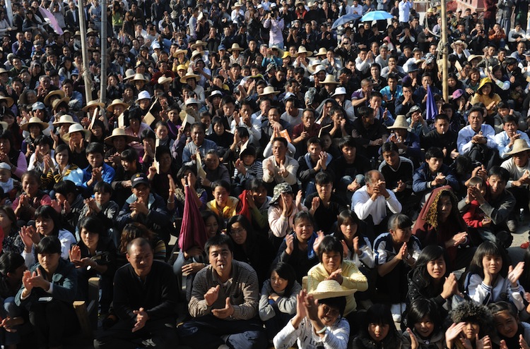 Протест жителей деревни Укань в провинции Гуандун, 21 декабря 2011 года. Фото: Mark Ralston/AFP/Getty