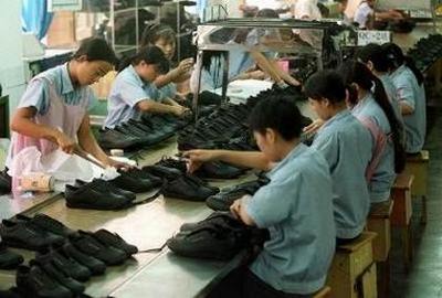 В провинции Гуандун закрываются обувные фабрики. Фото: AFP