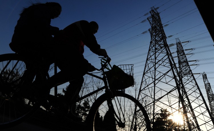 Сокращение потребления электроэнергии отражает спад экономики Китая. Фото: Frederic J. Brown/AFP/Getty Images
