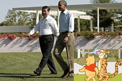 Поширений в мережі колаж: Барак Обама і Сі Цзіньпін; Вінні Пух і Тигр