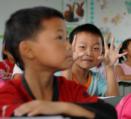 Китайцы на питание чиновников тратят больше денег, чем на образование своих детей. Фото: China Photos/Getty Images