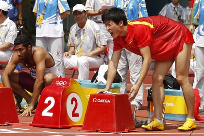 Невероятные спортивные успехи китайцев вызывают сомнения у специалистов. Фото: AFP PHOTO / ADRIAN DENNIS