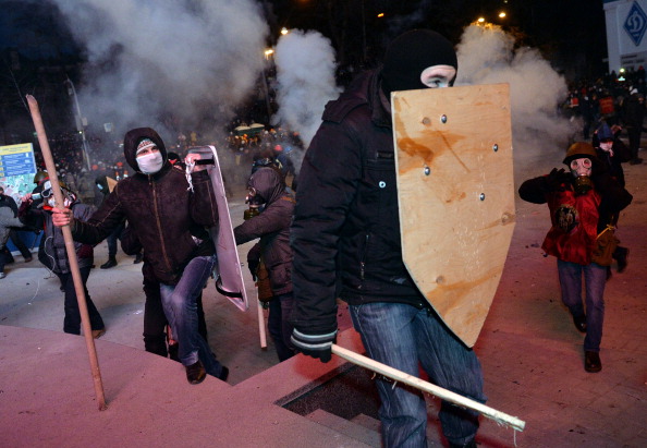 Протестувальники під час мітингу опозиції в центрі української столиці 19 січня 2014 р. Фото: SERGEI SUPINSKY/AFP/Getty Images