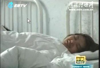 Ден Юйцзяо, запертая в психиатрической лечебнице. Снимок с экрана ТВ г.Эньши. Фото: The Epoch Times