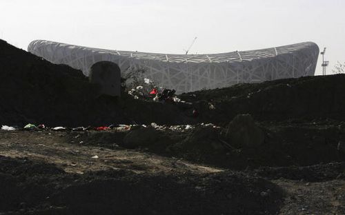 Главный стадион Олимпиады 2008г в Пекине «Птичье гнездо». Китайские власти сделали проведение Олимпиады политическим ходом. Фото: Guang Niu/Getty Images