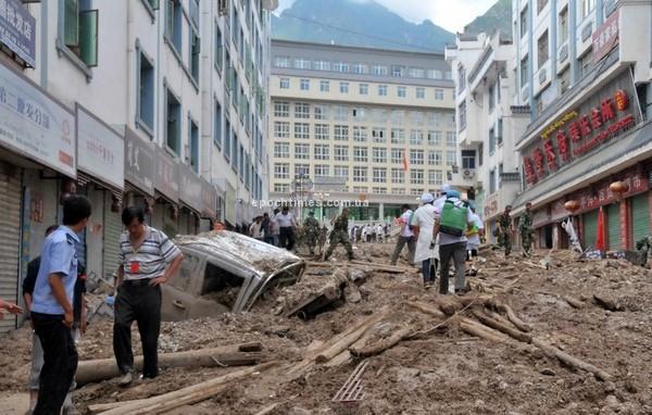 Результат оползня и наводнения в китайской провинции Ганьсу в августе 2010 года, в результате которого погибло более 300 человек. Фото: AFP/Getty Images