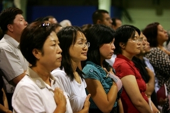 Китайцы на церемонии принятия американского гражданства. Фото: David McNew/Getty Images