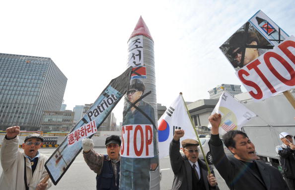 Южнокорейцы протестуют против запуска ракеты. Фото: Getty Images