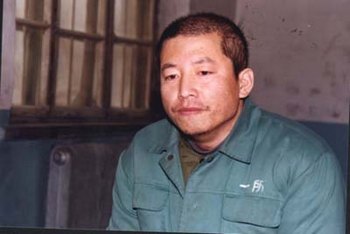 Лян Чженьсін у в'язниці. Березень 2002 р.