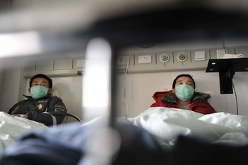 В Китае продолжает быстрыми темпами распространяться эпидемия гриппа А/H1N1. Фото: STR/AFP/Getty Images