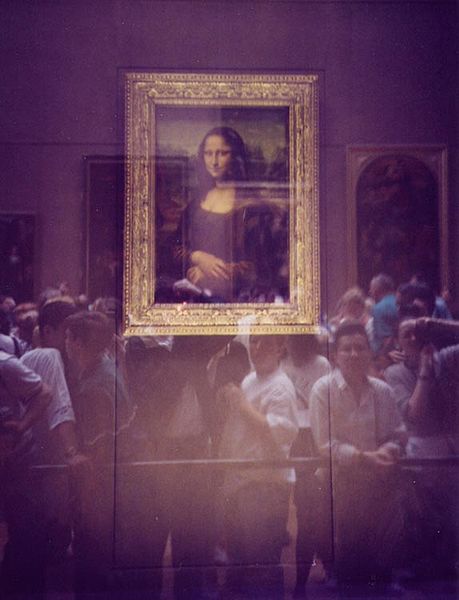 «Мона Ліза» за куленепробивним склом у Луврі. Фото: Mats Halldin