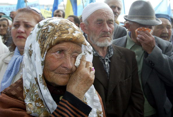 Ні заході із вшанування пам'яті загиблих під час та після депортації. 2004 рік. Фото: SERGEI SUPINSKY/AFP/Getty Images