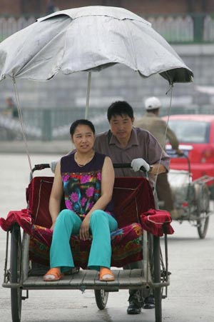 Місто Дютай. Триколісне таксі. Фото: China Photos/getty Images 