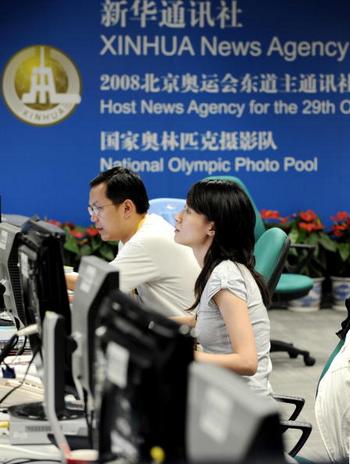 Главный сайт китайской компартии Xinhua.net был причислен к разряду очень небезопасных сайтов. Фото: JEWEL SAMAD/AFP/Getty Images
