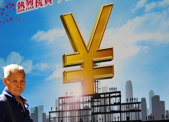 На задньому плані - плакат з рекламою китайського юаня (Renminbi - RMB) у Гонконгу, 18 серпня 2011 р. Фото: Laurent Fievet / AFP / Getty Images