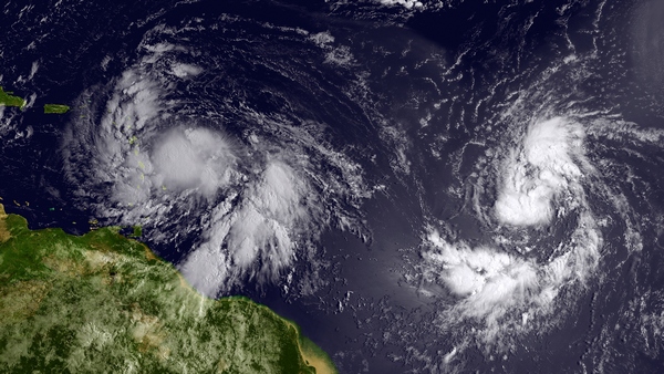 На снимке показано, как тропический шторм «Исаак» приобрел статус шторма и приближается к Антильским островам 22 августа 2012 в Атлантическом океане. Фото: NOAA / Getty Images