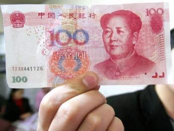 Китайские фальшивые юани невозможно распознать обычными детекторами валют. Фото с epochtimes.com