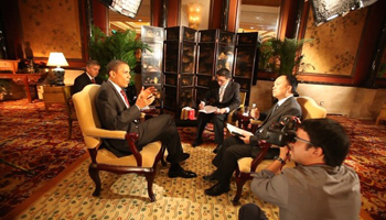 Президентом США Барак Обама даёт эксклюзивное интервью газете Southern Weekend . Фото: телеканал NTD