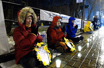 Мирный протест последователей Фалуньгун напротив китайского посольства в Киеве. Фото: Владимир Бородин/ The Epoch Times