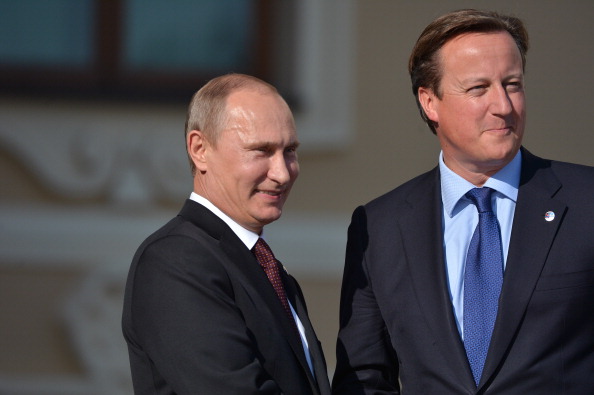Владимир Путин и Дэвид Кэмерон (справа). Фото: Alexey Kudenko/Host Photo Agency via Getty Images