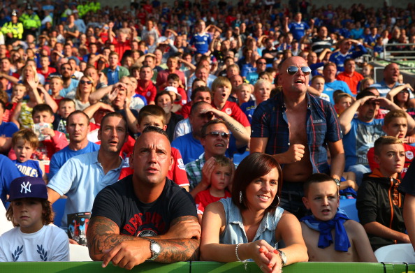 Фанаты в Кардиффе, Уэльсе, 25 августа 2013 года. Фото: Michael Steele/Getty Images