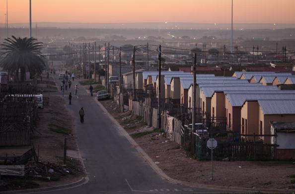 Жизнь в одном из старейших южноафриканских городов Нью-Брайтоне. Фоторепортаж. Фото: Dan Kitwood/Getty Images