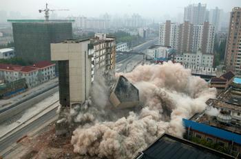 Срок эксплуатации зданий в Китае составляет всего 20-30 лет. Фото: China Photos/Getty Images