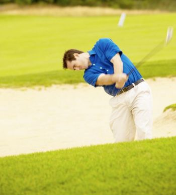 Биомеханики гольфа напоминают нам, что клюшка не должна сама себя размахивать. Фото: Photos.com