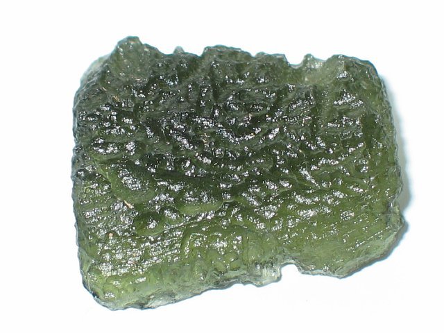 Кусок молдавита, стеклообразного кремнистого минерала. Фото: wikipedia.com