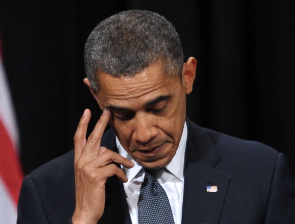 Обама во время выступления в Ньютауне, 16 декабря 2012 г. Фото: MANDEL NGAN/AFP/Getty Images
