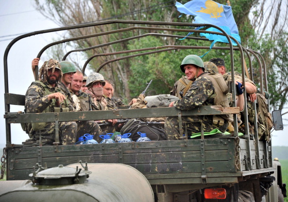 Украинские солдаты, на пути в Славянск, 19 мая 2014 года. Фото: Евгений Савилов/AFP/Getty Images