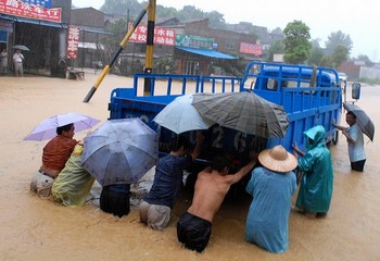 Наводнение в провинции Цзянси. 29 июля 2009 год. Фото: AFP/Getty Images
