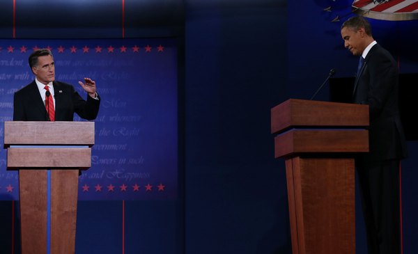 Митт Ромни и Барак Обама во время дебатов 3 октября. Фото: Justin Sullivan/Getty Images