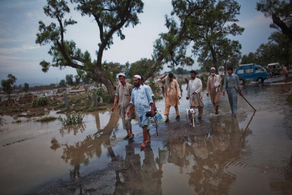 Наводнения в Пакистане приносят новые жертвы. Фоторепортаж. Фото: Daniel Berehulak/A Majeed/RIZWAN TABASSUM/BEHROUZ MEHRI/STRDELARIF ALI /SAJJAD QAYYUM//RIZWAN TABASSUM/AFP/Getty Images