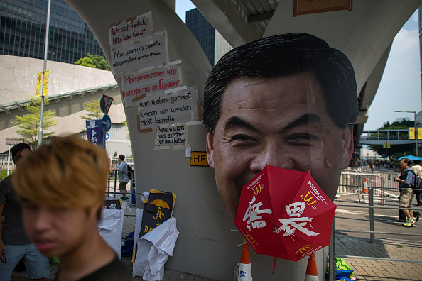 Сторонники демократических реформ собираются на улице, которая ведёт к правительственному комплексу. 30 сентября 2014 года, Гонконг. Фото: Anthony Kwan/Getty Images 