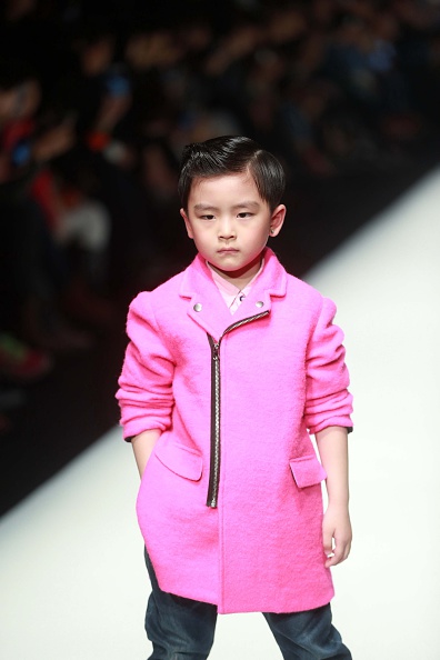 Дитяча мода на показі в Китаї. Фото: STR/AFP/Getty Images 