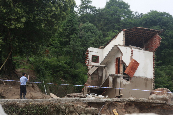 Зруйнований стихією будинок. Провінція Хунань, Китай. Фото: STR/AFP/Getty Images 