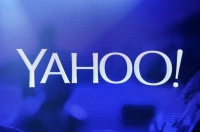 Логотип Yahoo, показаний на екрані під час вітальної промови президента і генерального директора Yahoo Марісси Майєр на виставці International CES 2014 у Лас-Вегасі, 7 січня 2014 року. Фото: Ethan Miller/Getty Images