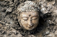Одна із 3000 статуй Будди, знайдених у 2012 році. Фото: Сунь Цзифу/ImagineChina/AP