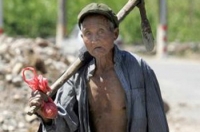 Китайской компартии выгодно, чтобы крестьяне оставались бедными.Фото с epochtimes.com