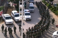 Полицейские прибыли для подавления бунта крестьян. 31 августа 2009 год. Посёлок Фэнвэй провинции Фуцзянь. Фото: epochtimes.com