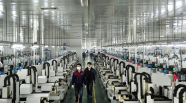 Работники китайской фабрики коллективно вышли из компартии