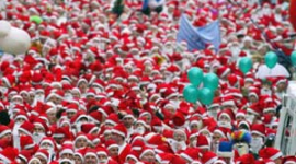 Фоторепортаж: тисячі Санта пробігли вулицями Ньютона у Великобританії